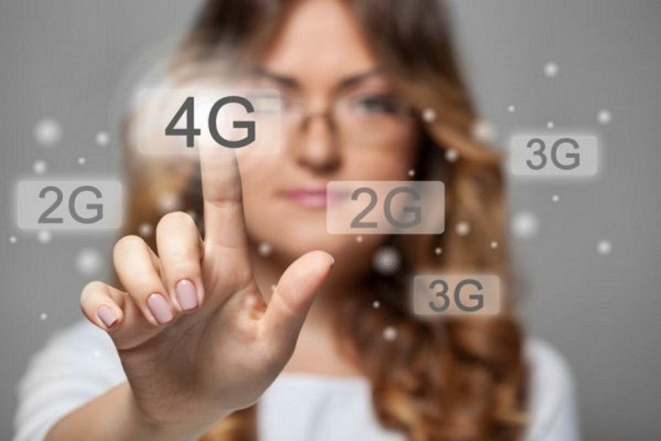 Image showing a woman selecting 4G out of other options such as 2G and 3G.